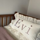 Kussen Evi met lila en roze tinten
